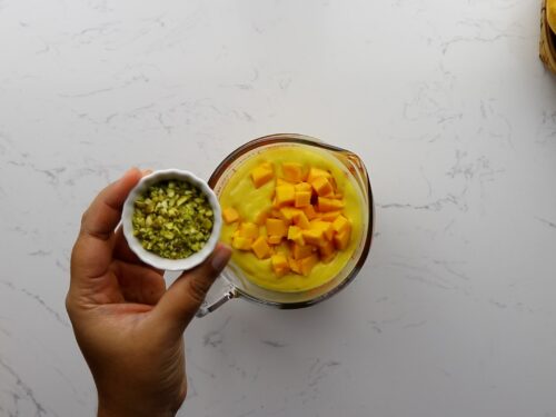 Mix in fresh mango and pistachios